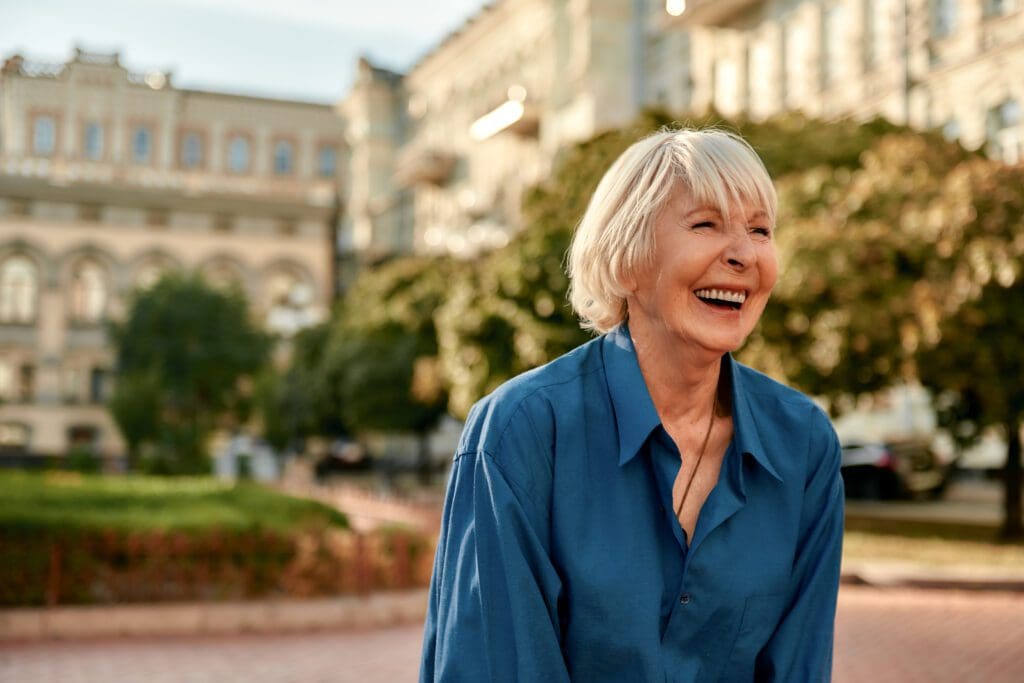 Don't stop laughing! Beautiful senior woman in casual wear smiling and feeling happy while